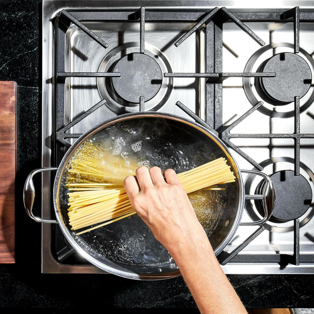 HexClad Hybrid Nonstick 6.5-Quart Oval Dutch Oven with Stainless Steel Lid, Stay-Cool Handles, Dishwasher-Friendly, Oven-Safe Up to 900°F, Induction Ready, Compatible with All Cooktops